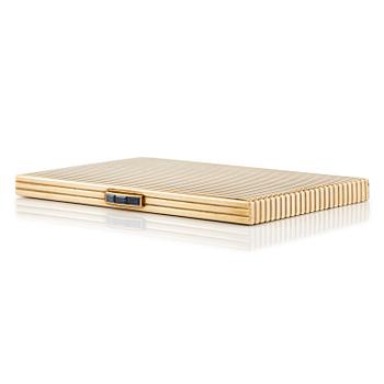 392. A Cartier 9 carat gold and calibré-cut sapphires cigarette case, London.