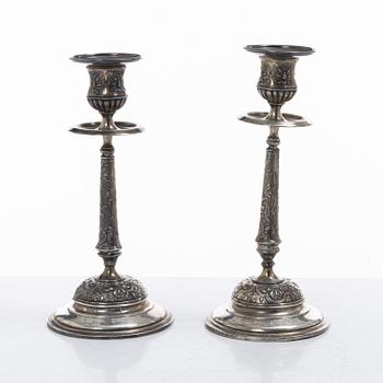 A pair of Swedish silver Renaissance-revival candlesticks, mark of CG Hallberg, Stockholm 1883.