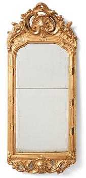 87. A Swedish Rococo mirror.