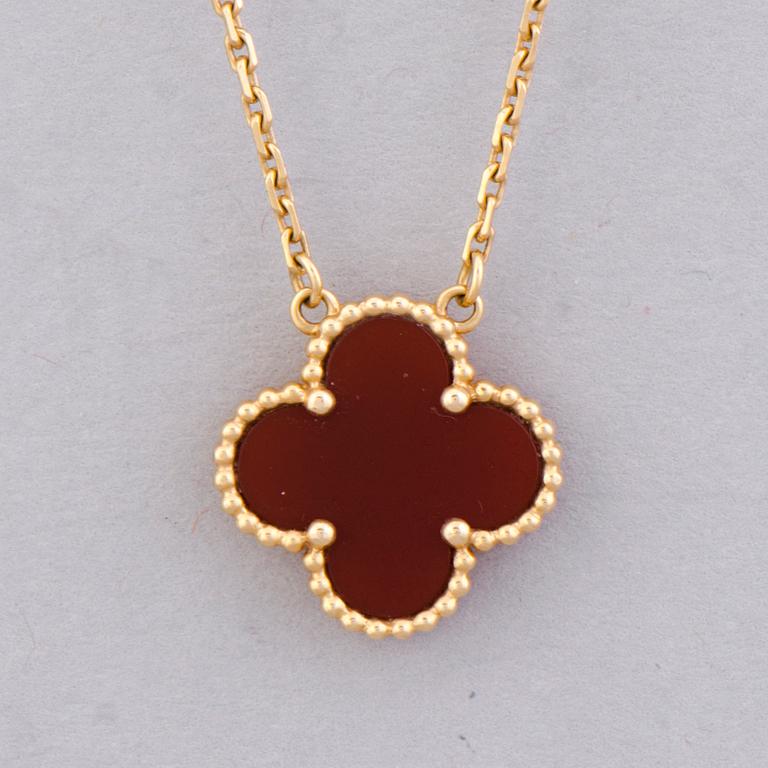 A VAN CLEEF & ARPELS NECKLACE, 'Alhambra'. 18K gold, carnelian.