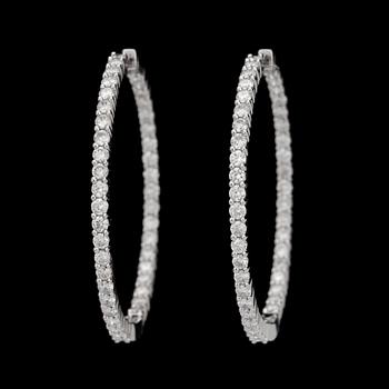 A pair of diamond, 2.64 cts in total, earrings.