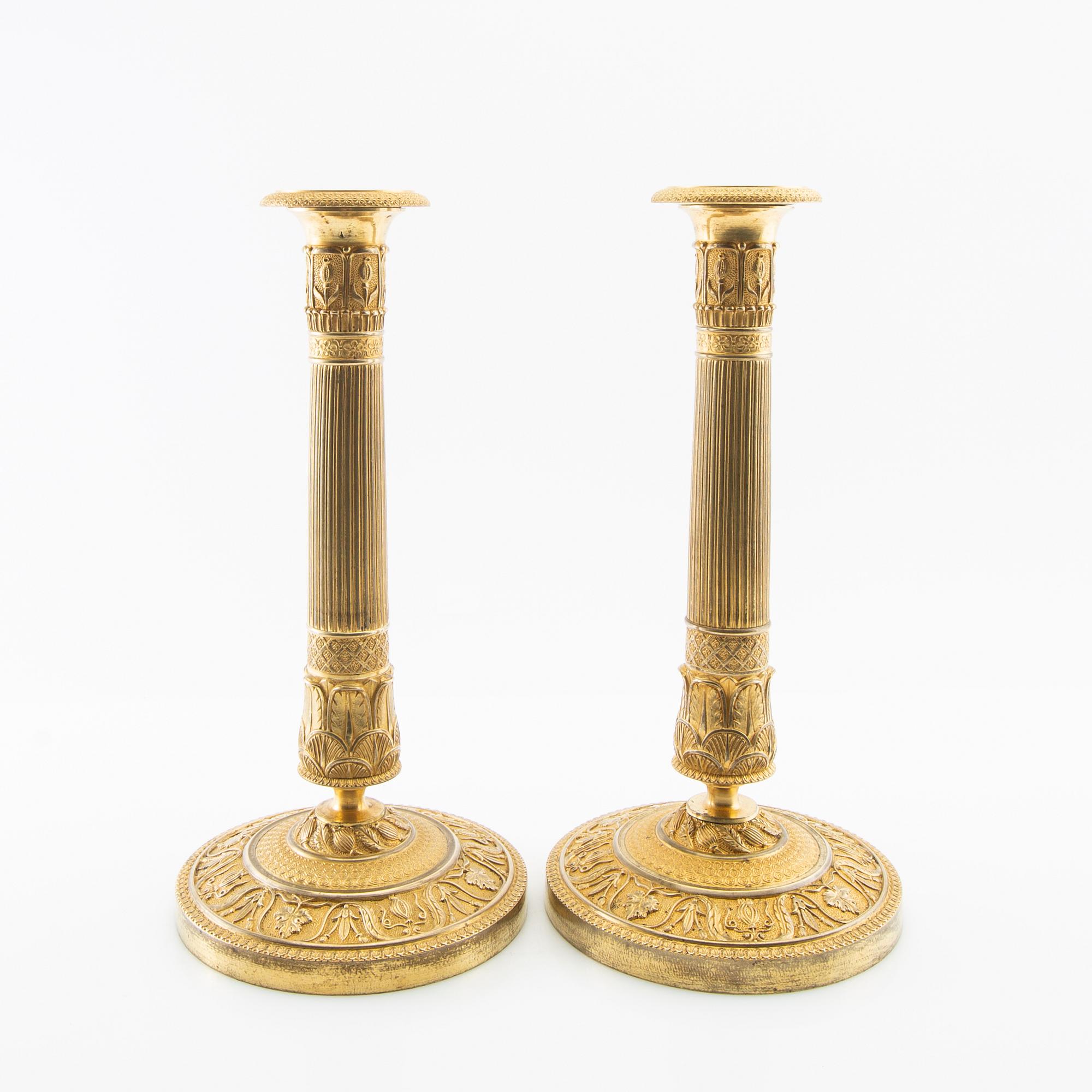 A pair of candlesticks, Empire France first half of the 19th century.