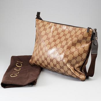 GUCCI, a messenger bag.