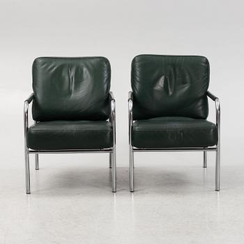 Gabriele Mucchi, a pair of steel and leather easy chairs, Zanotta, Italy, the model designed in 1983.