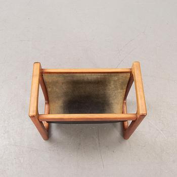 A 1960/70s teak newspaper stand.