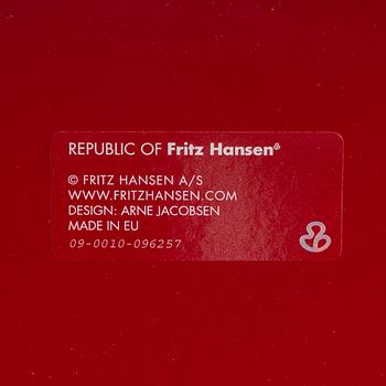 A 'Måsen/liljan' armchair on wheels by Arne Jacobsen, Fritx Hansen.