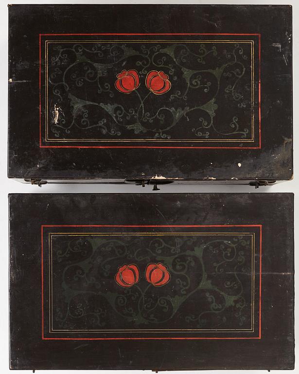 A lacquered cabinet, in two sections, Qing dynasty, 19th Century.