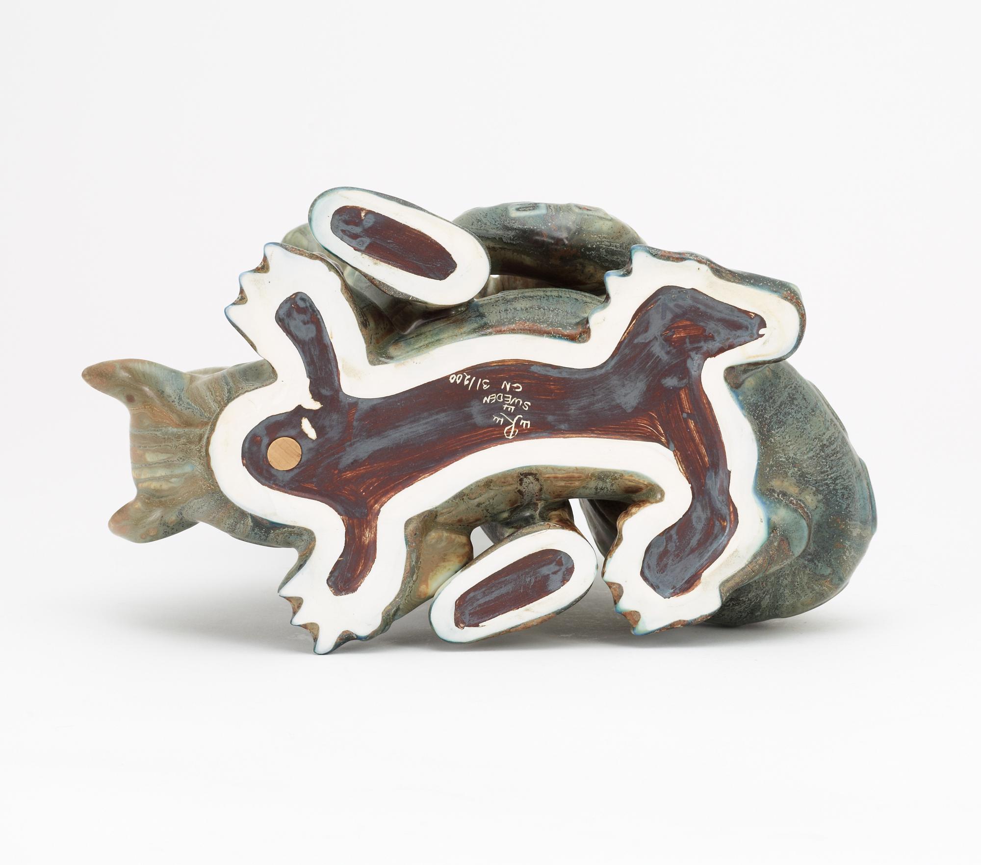 A Gunnar Nylund stoneware sculpture of S:t Michael and the dragon, Rörstrand.