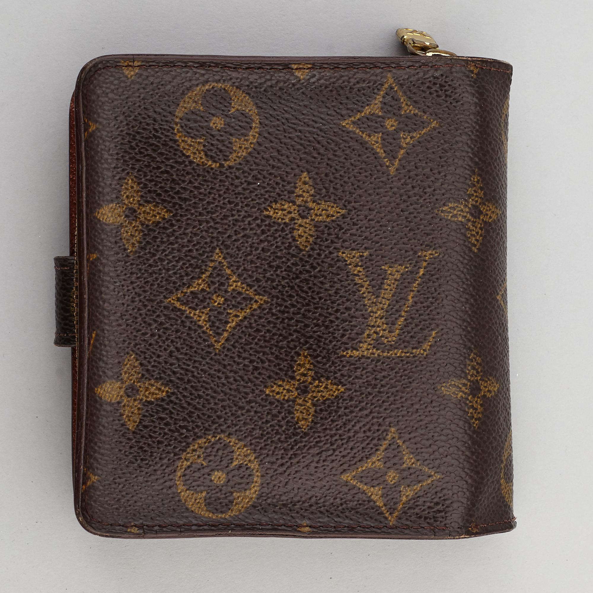 LOUIS VUITTON, a monogram canvas wallet.