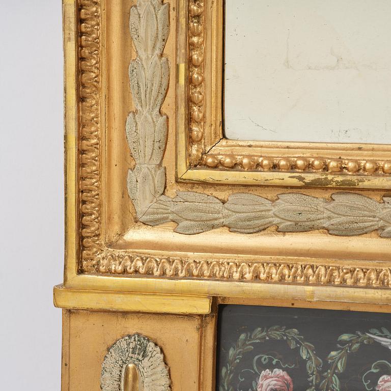 A late Gustavian giltwood and gouache-inset mirror attributed to Hedberg & Lindblad, (Stockholm 1802-05).