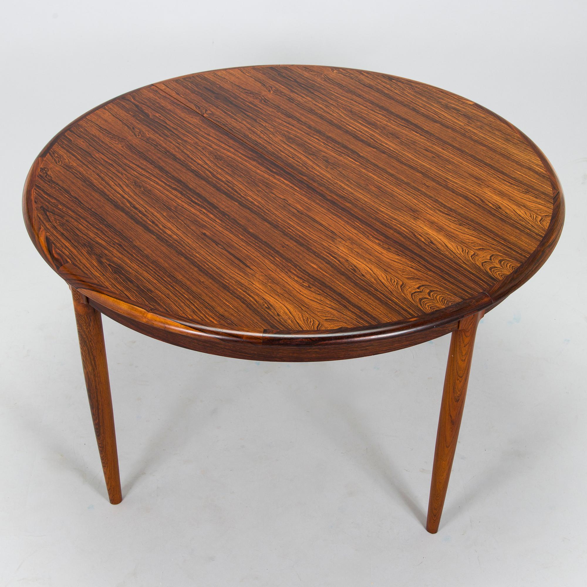 Niels Otto Møller, A 1950s dining table and six '77' chairs for J.L. Møllers Møbelfabrik Denmark.