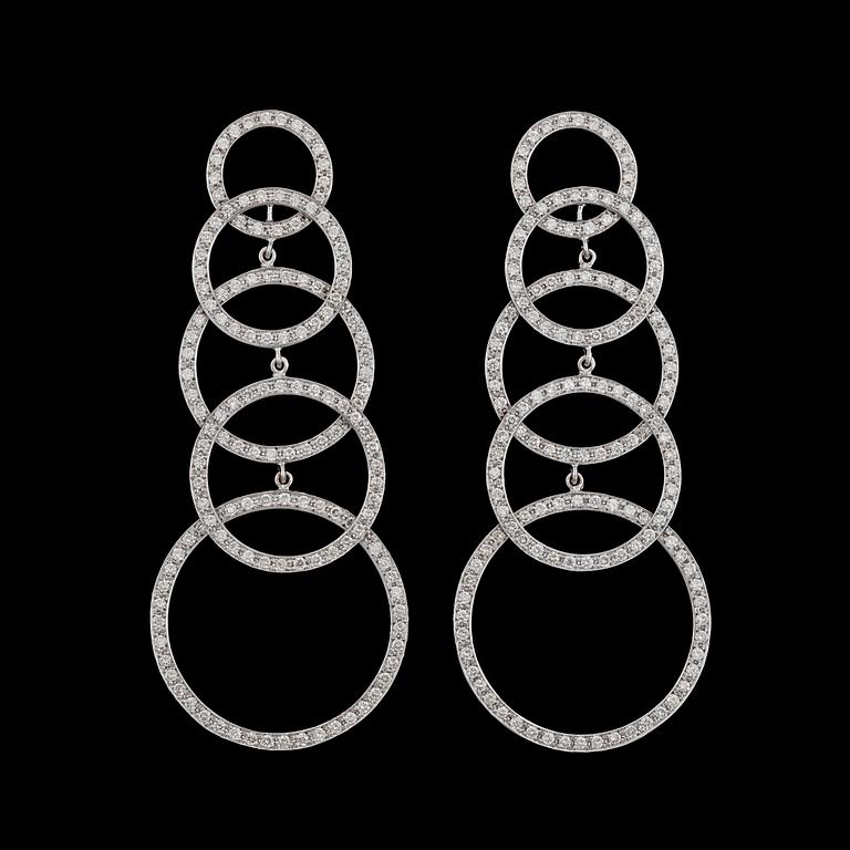 A pair of brilliant cut diamond earrings, tot. 3.38 cts.