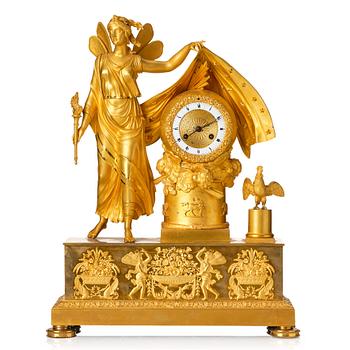 A French Empire mantel clock. Marked "LE NEPVEU A PARIS".