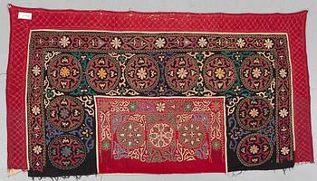 A Suzani textile, ca 247 x 128 cm.