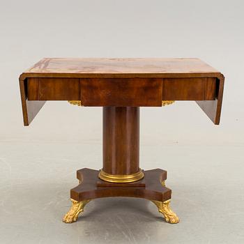 A mahogany table in Karl Johan style early 20th century.