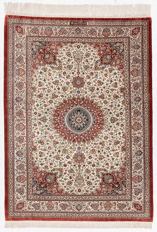 A silk Qum, Central Persia, signed Jashmedi c. 141 x 103 cm.