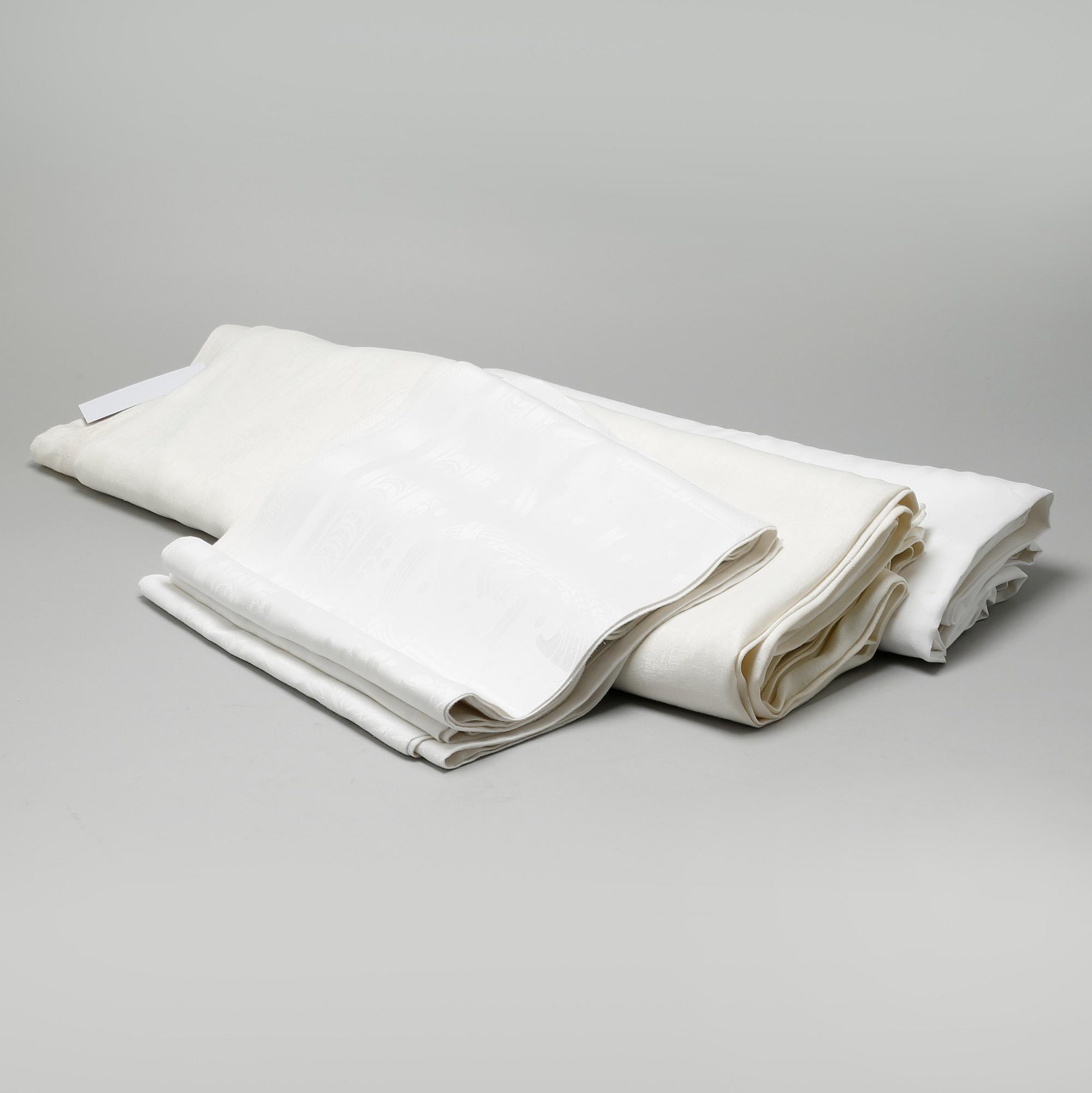 Three linen table cloths, 19th and 20th century.