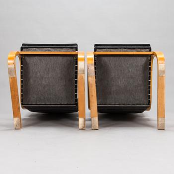 Alvar Aalto, A pair of mid-20th century '34/401' armchairs for  O.Y. Huonekalu- ja Rakennustyötehdas A.B. Finland.