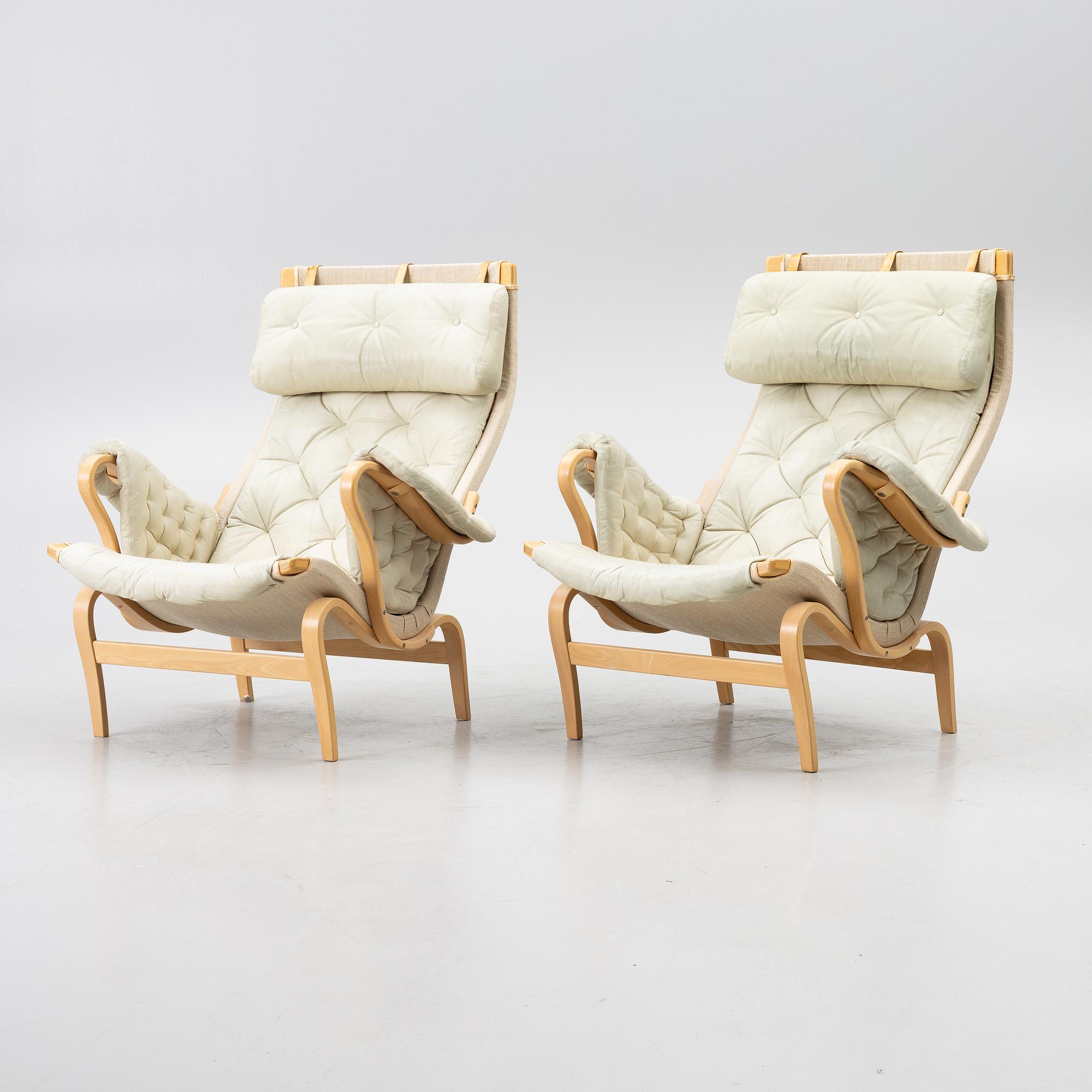 Bruno Mathsson, a pair of 'Pernilla' armchairs, Dux, Sweden, later part of the 20th century.