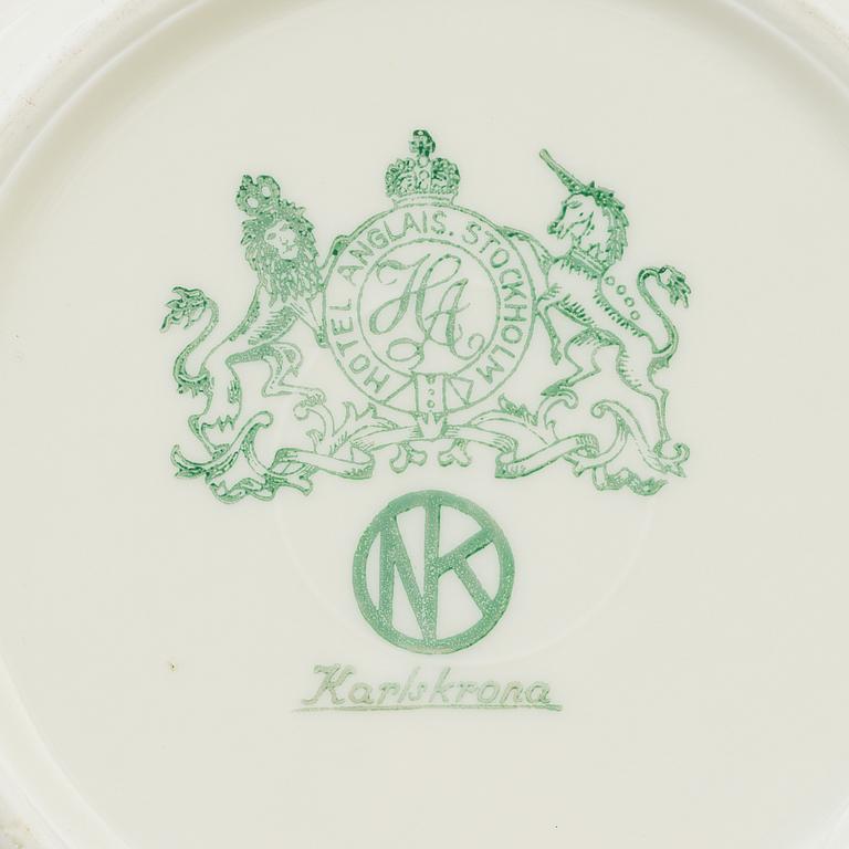 A set of 15 porcelain plates from Nordiska Kompaniet, first half 20th century.