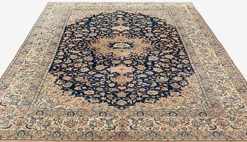 A carpet, semi-antique, part silk Nain, so called 4 Laa, ca 320 x 210,5 cm.