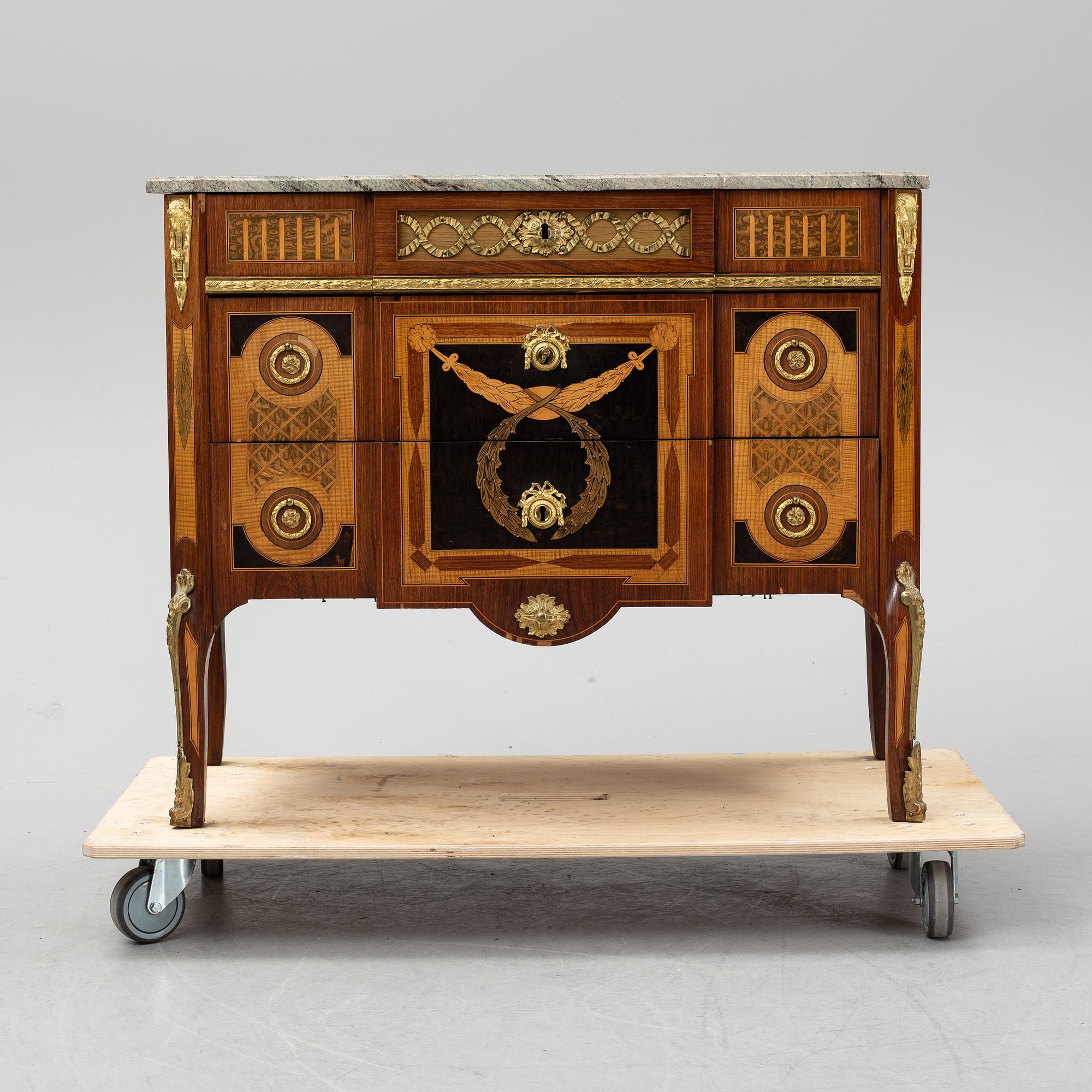 A late Gustavian style chest of drawers, from around the year 1900.