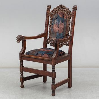 A Baroque style oak armchair, first half of the 20th Century.