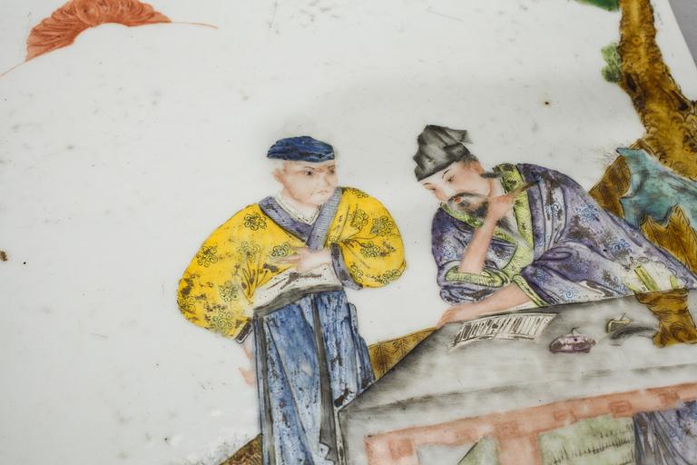 Two Chinese porcelain tiles from the 20th century.