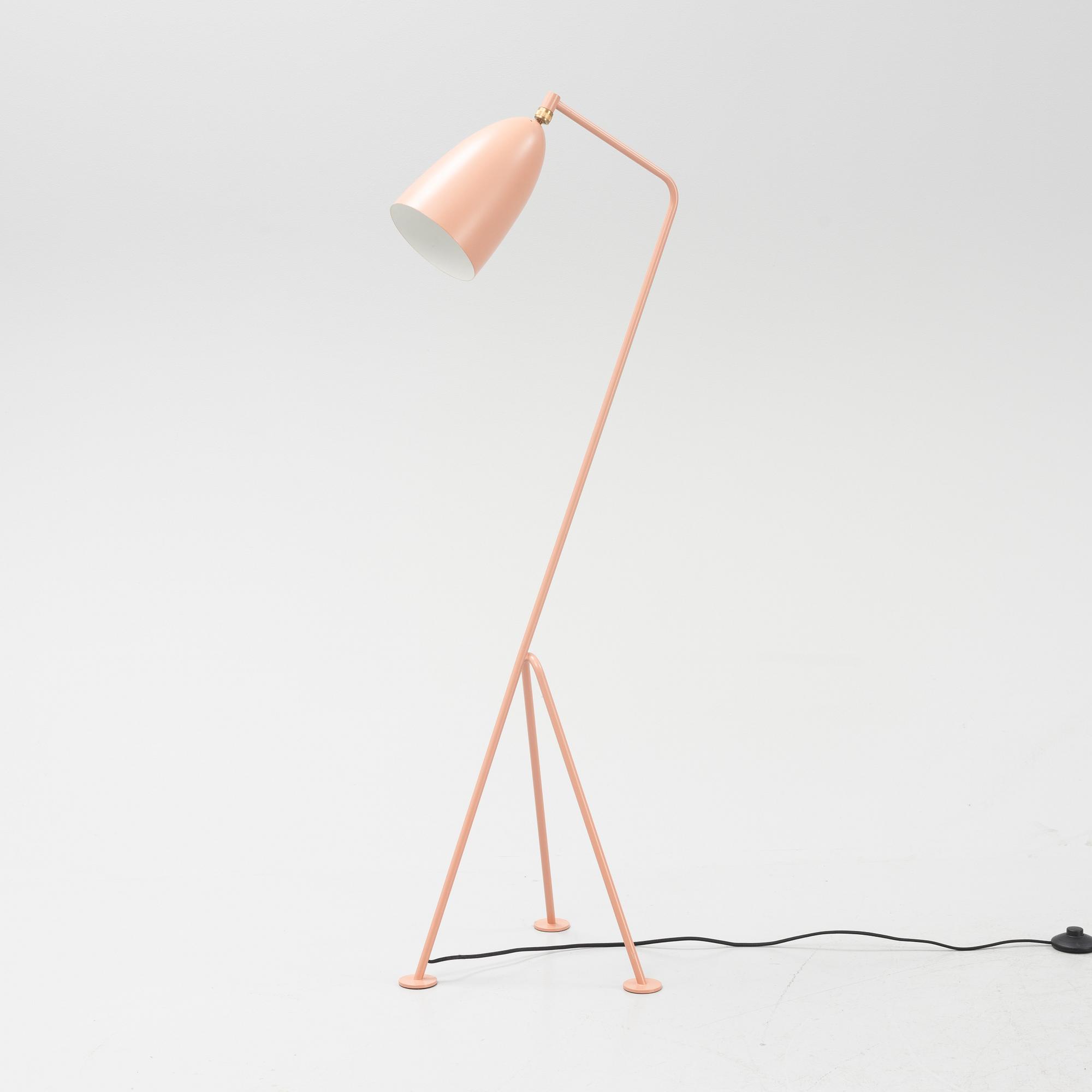 A 'Grasshopper' floorlamp by Greta Magnusson Grossman for Gubi.