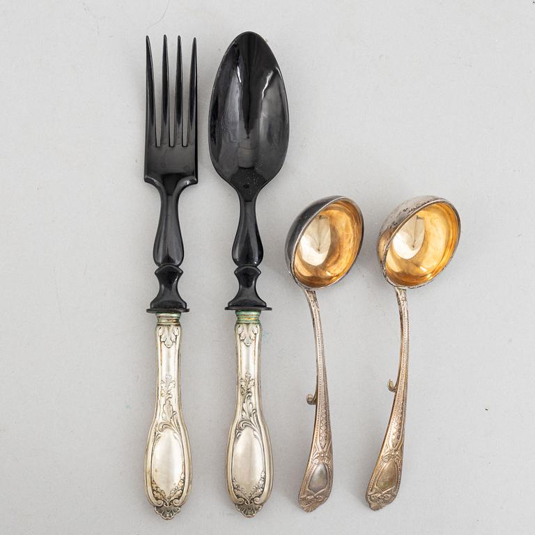 A pair of silver serving cutlery and a pair of sauce spoons, including Germany, early 20th century.