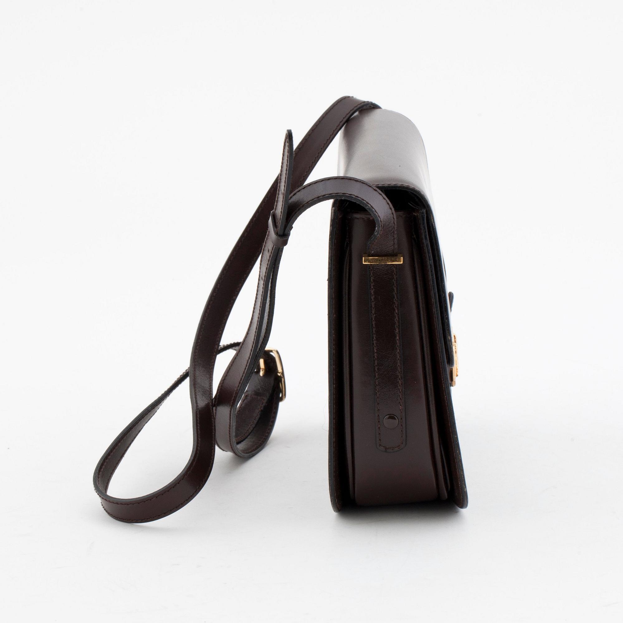 CÉLINE, a brown leather shoulderbag.