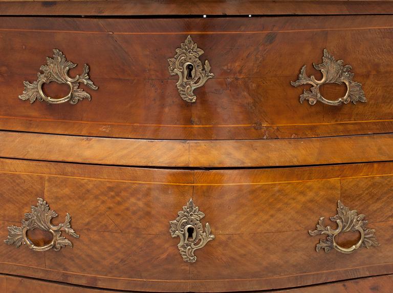 A 1700s rococo commode.