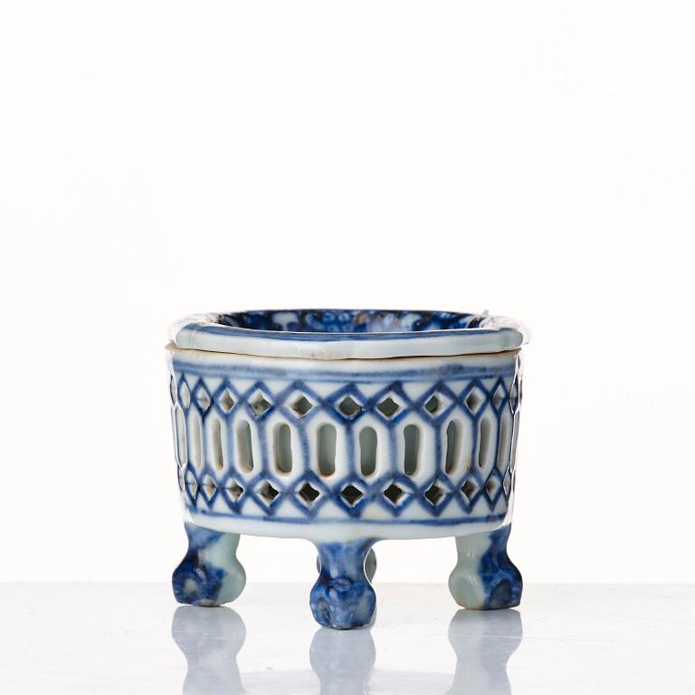 A blue and whtie reticulated salt with liner, Qing dynasty, 18th Century.