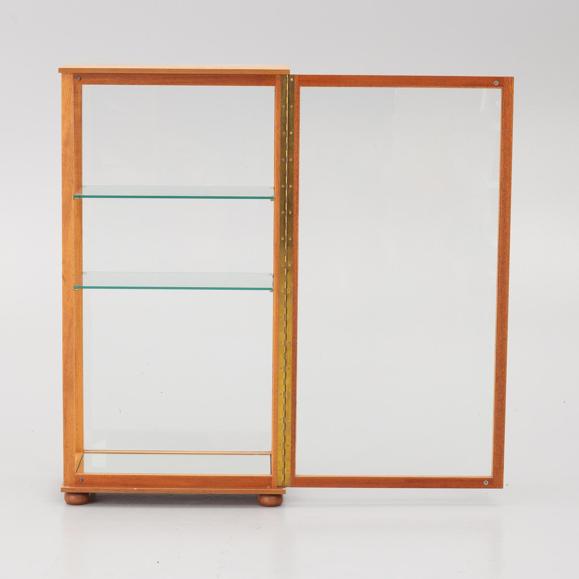 Josef Frank, a display cabinet, model 649, Svenskt Tenn, post 1985.