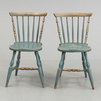 A pair of late 19th century painted chairs.