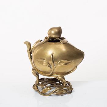 A Chinese brass 'peach' censer, first part of of the 20th century.