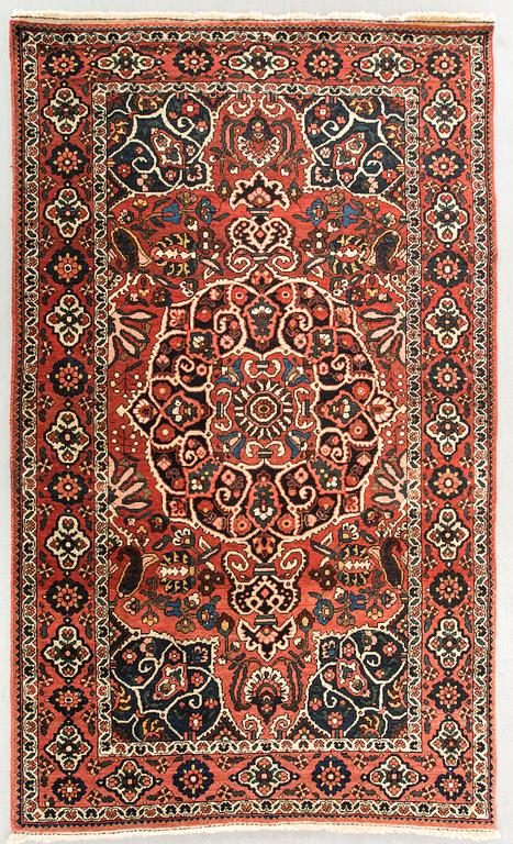 An antique Bachtiari carpet ca 205 x 134 cm.