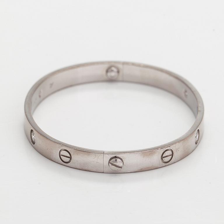 Cartier, rannekoru "Love", 18K valkokultaa, briljanttihiottuja timantteja.