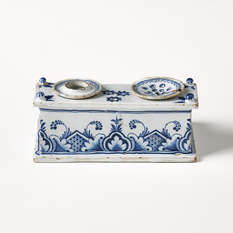 A Swedish Rörstrand faience desk set, dated Stockholm 22/11 1745.