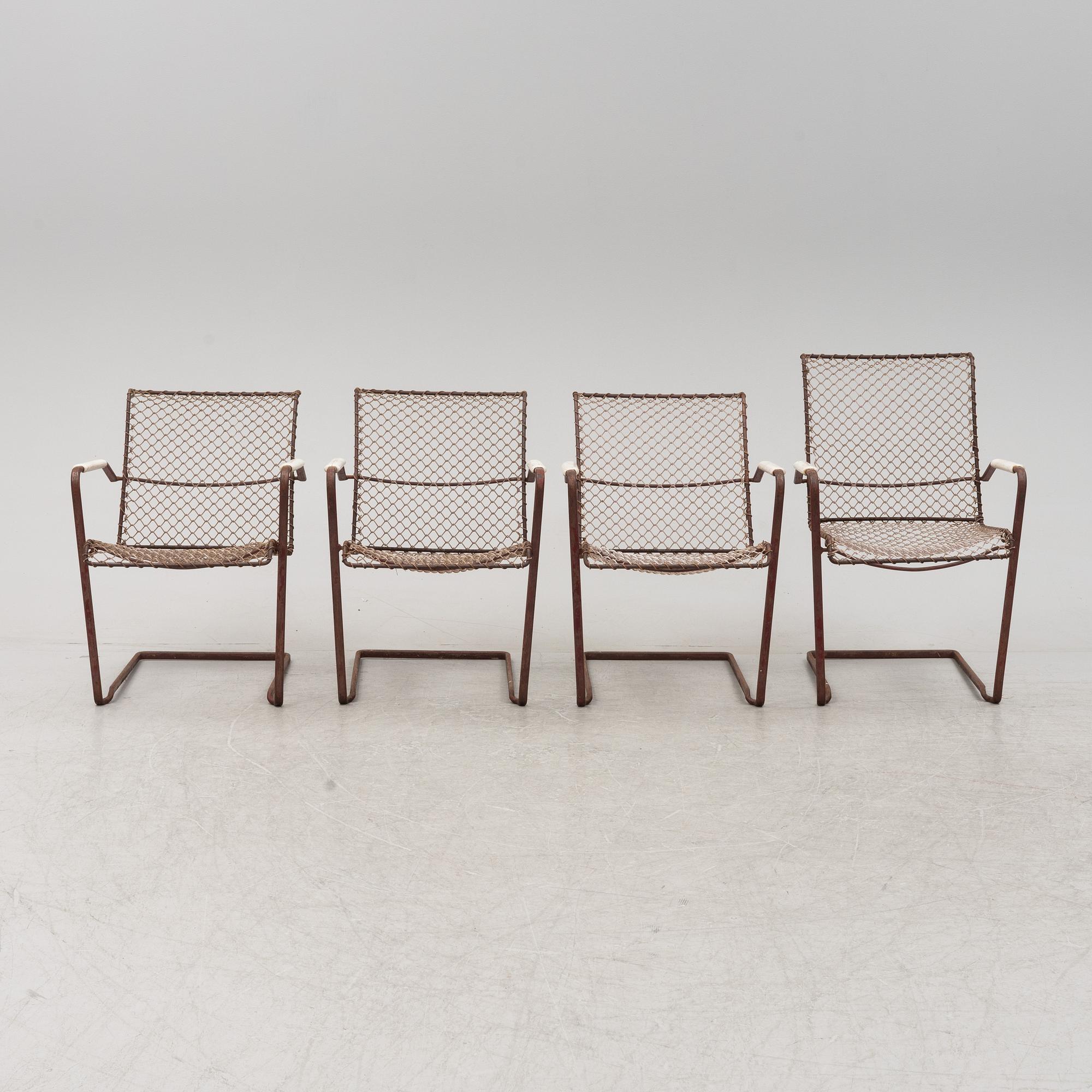 A set of four patio chairs from Grythyttan Stplmöbler, mid 20th Century.