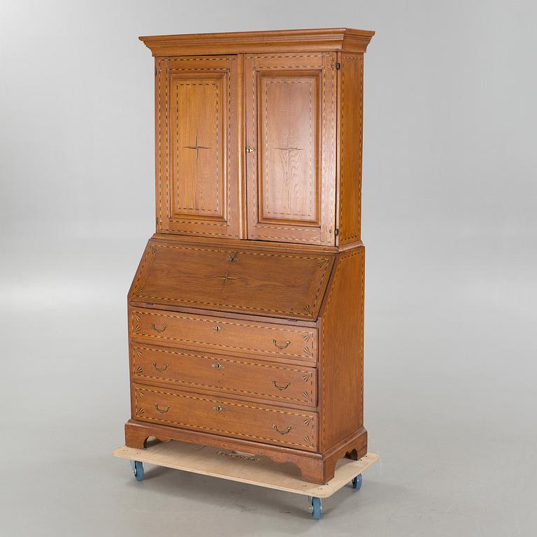 A writing cabinet, probably from Småland, first half of the 19th century.