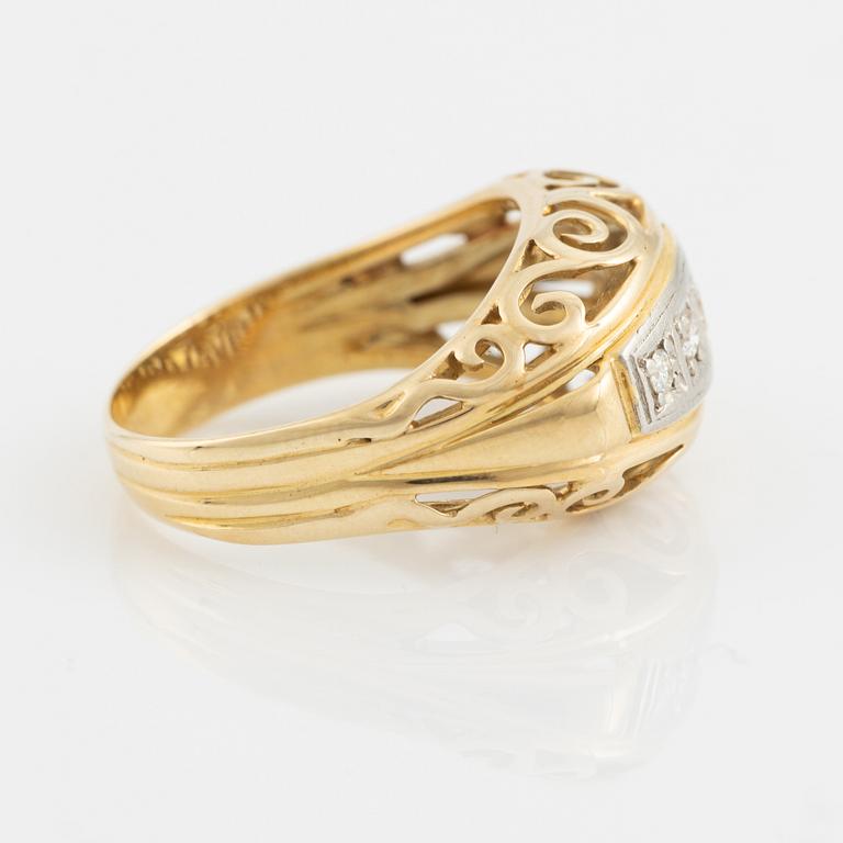 14K gold and brilliant cut diamond ring.