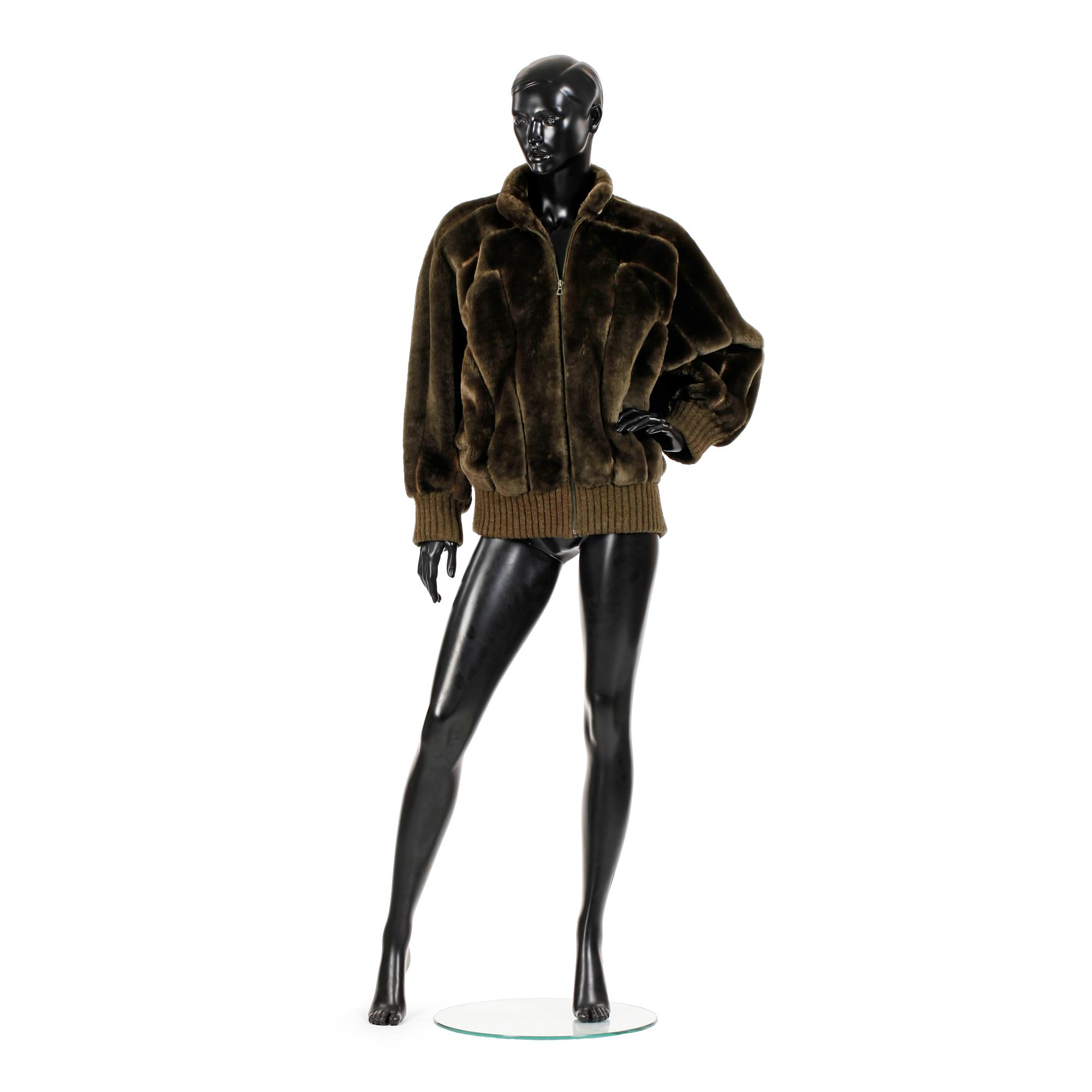 CHRISTIAN DIOR, a lamb fur jacket.