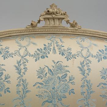 A grey-painted Gustavian 'canapé en corbeille'. sofa, by J E Höglander.