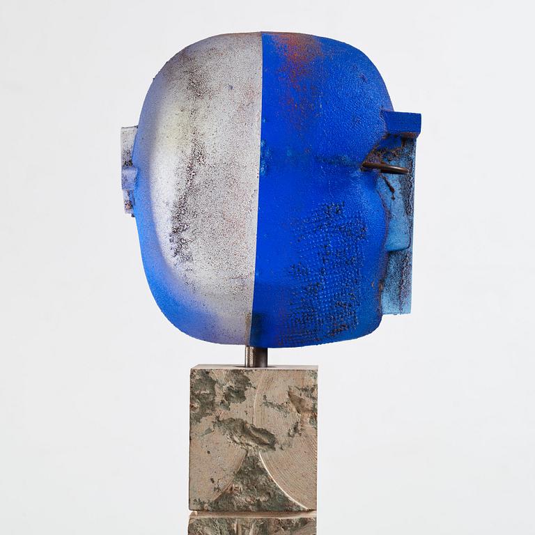 Bertil Vallien, a unique sand casted blue glass 'Head' sculpture on a hewn and polished limestone plinth, Kosta Boda, Sweden.