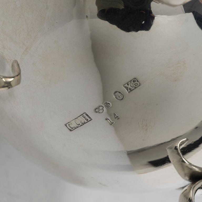 Sugar caster and salt and pepper shakers, silver, marked C.G. Hallberg, including Stockholm 1948.