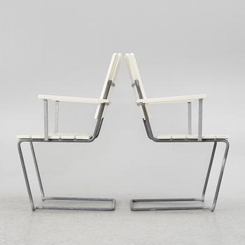 Arthur Lindquist, four armchairs model A2 and a table 9A, Grythyttan's steel furniture.