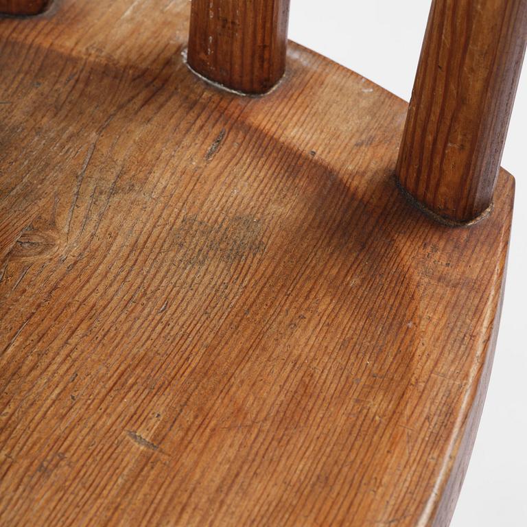 Axel Einar Hjorth, a set of four stained pine "Utö" chairs, Nordiska Kompaniet, Sweden, 1930s.