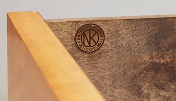 An Axel Einar Hjorth birch chest of drawers, 'Grand', Nordiska Kompaniet, NK, Stockholm 1930.