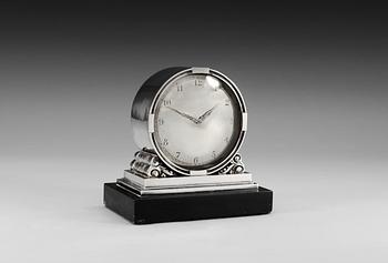 A Georg Jensen sterling mantle clock, designed by Johan Rohde, nr 596, maker's mark 1925-32.